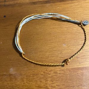 Multi color Puravida bracelet worn a couple times